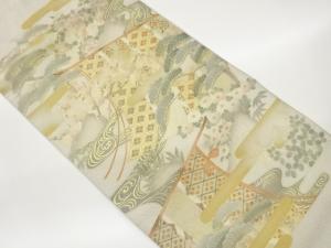 綴れ金彩几帳に草花・ヱ霞・流水模様袋帯